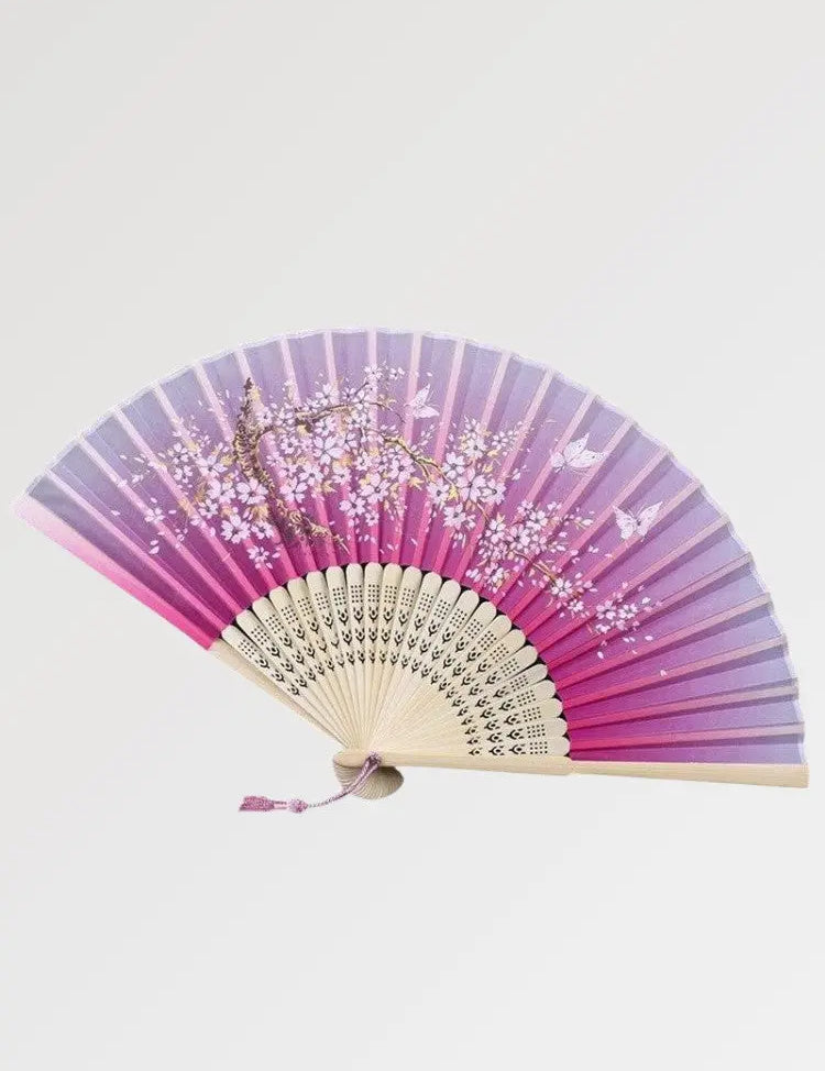 Éventail japonais au dégradé fushia et au design fleuri
