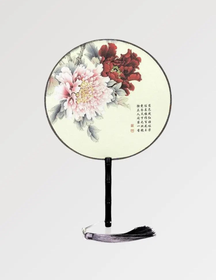 Magnifique éventail japonais rond aux motifs fleuris et aux inscriptions japonaises