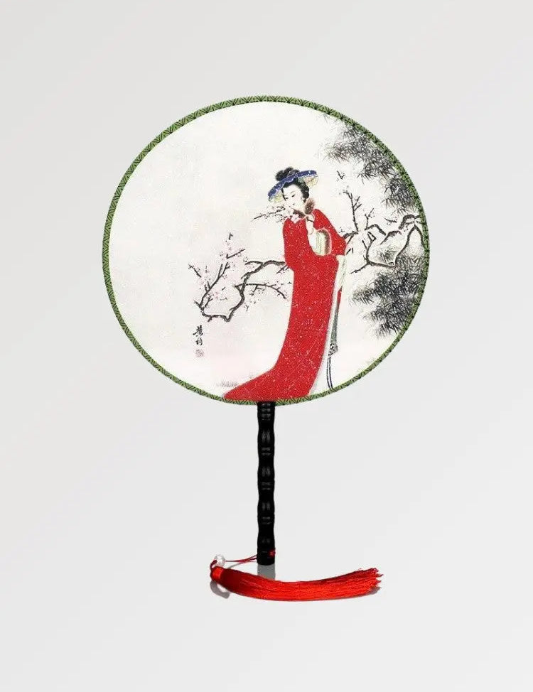 Éventail japonais rond au motif d'une maiko, l'apprenti geisha