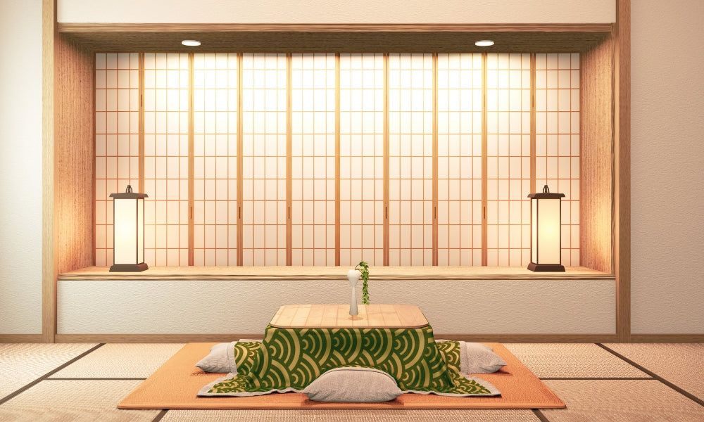Table chauffante japonaise kotatsu avec couverture matelassée et coussins de sol — le meuble emblématique de l'hiver japonais