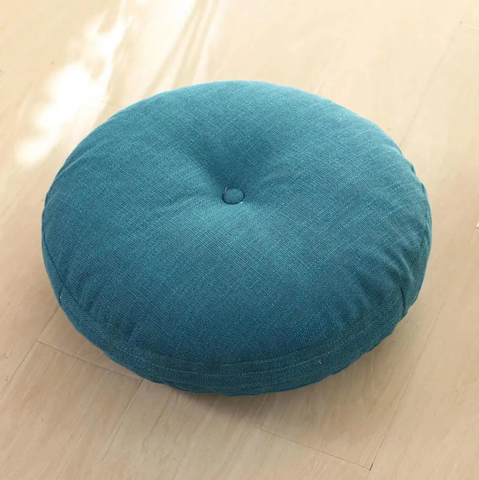Coussin rond bombé monochrome en coton-lin uni 4 teintes turquoise beige navy marron — vue de détail textile — Japanstreet