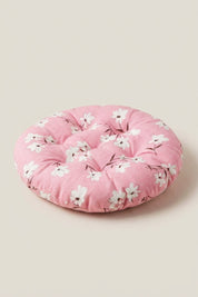 Coussin japonais 'Kiruto' imprimé de petites fleurs blanches sur rose — coussin de sol rond capitonné en tissu imprimé, surpiqûres régulières et bord rebondi