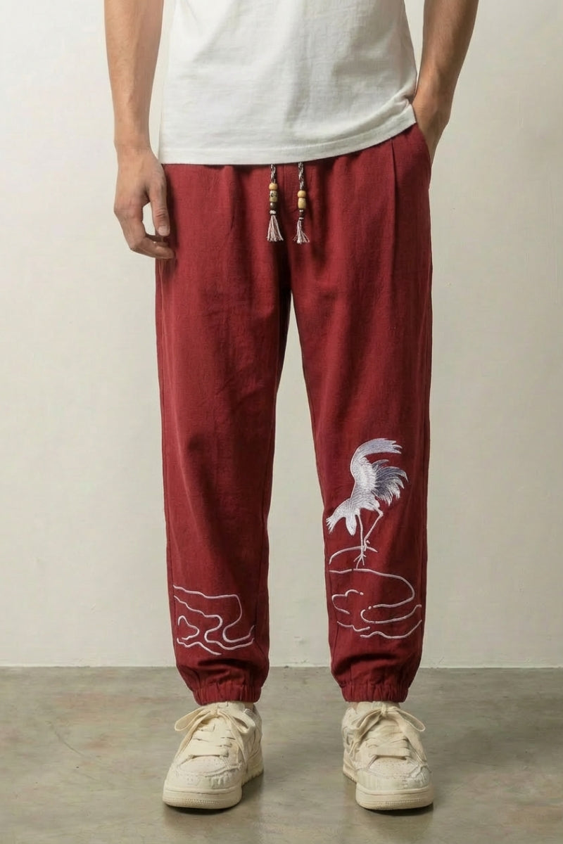 Pantalon japonais Tsuru rouge bordeaux à broderie de grue blanche sur le mollet Japanstreet