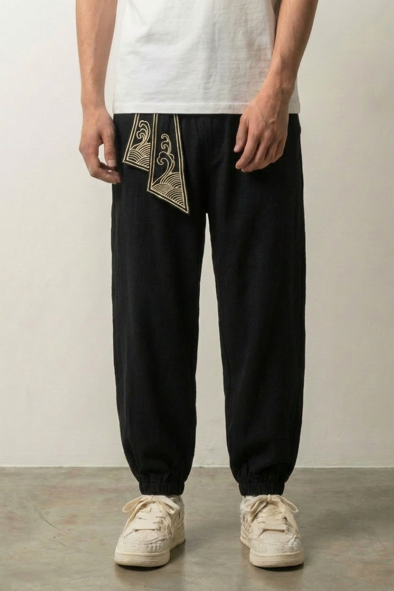 Pantalon ouvrier japonais Raijin noir à chevilles élastiquées et broderie blanche Japanstreet