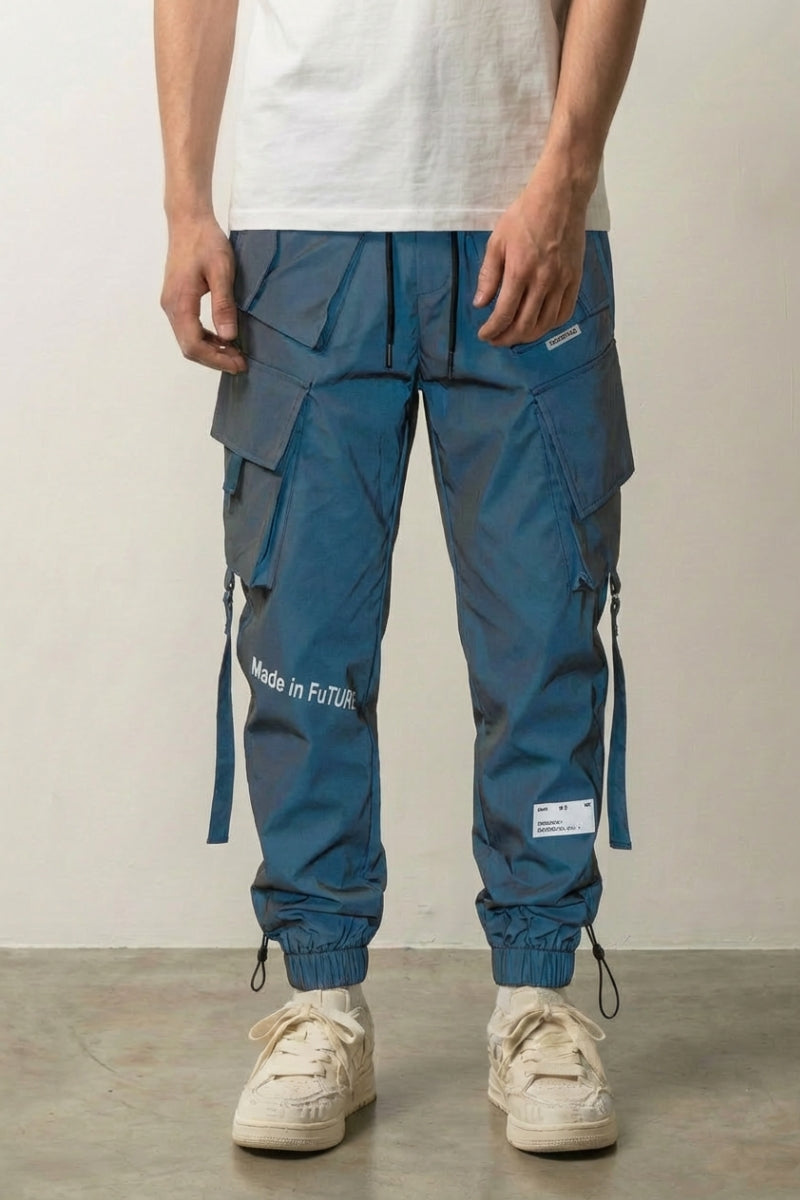 Pantalon réfléchissant Track Tactical bleu techwear à poches plaquées et print Made in Future Japanstreet