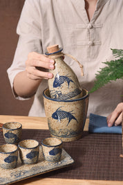 Service à saké japonais en grès avec flasque tokkuri et coupelles ochoko