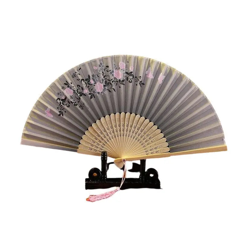 Éventail ancien — motif vintage estampes — vue de profil ou détail — Japanstreet