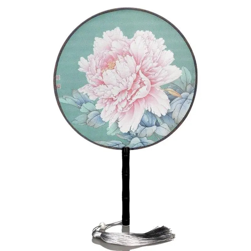 Éventail uchiwa rond vintage — motif d'inspiration ancienne — vue de profil ou détail — Japanstreet