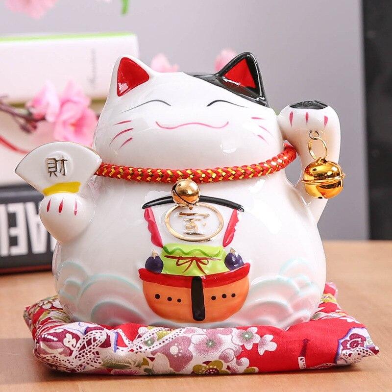 Maneki-neko tirelire avec torii shintō rouge peint sur le ventre en grammaire sacrée — vue de profil arrière — Japanstreet