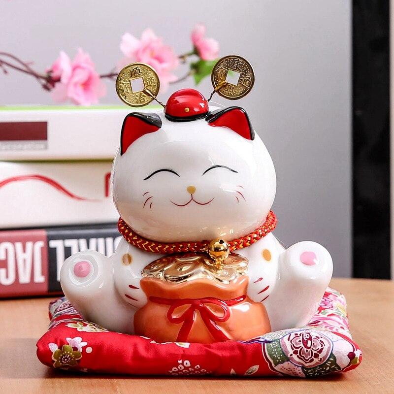 Maneki-neko tirelire en posture de chat pétrissant avec sac d'or et fukubukuro — vue de profil arrière — Japanstreet