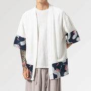 La veste japonaise pour homme dans une couleur blanche au motif de grues